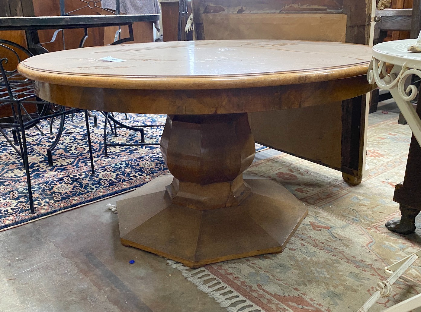 An Art Deco style circular figured walnut low centre table, diameter 120cm, height 62cm